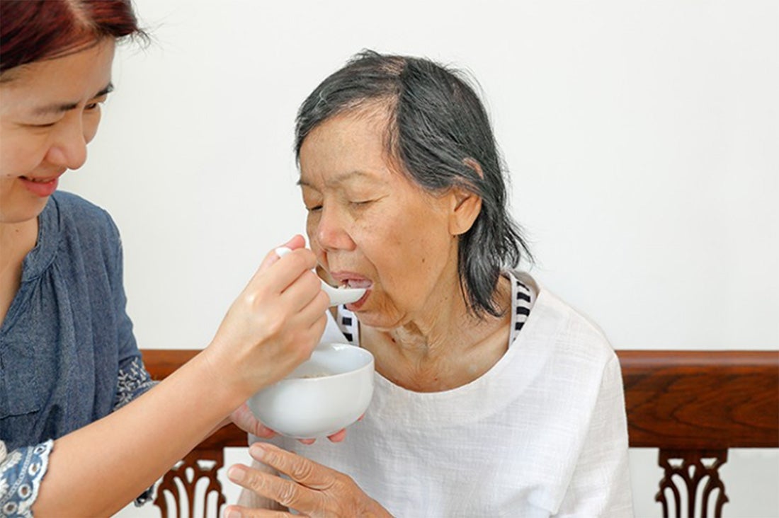 Elder woman eating
