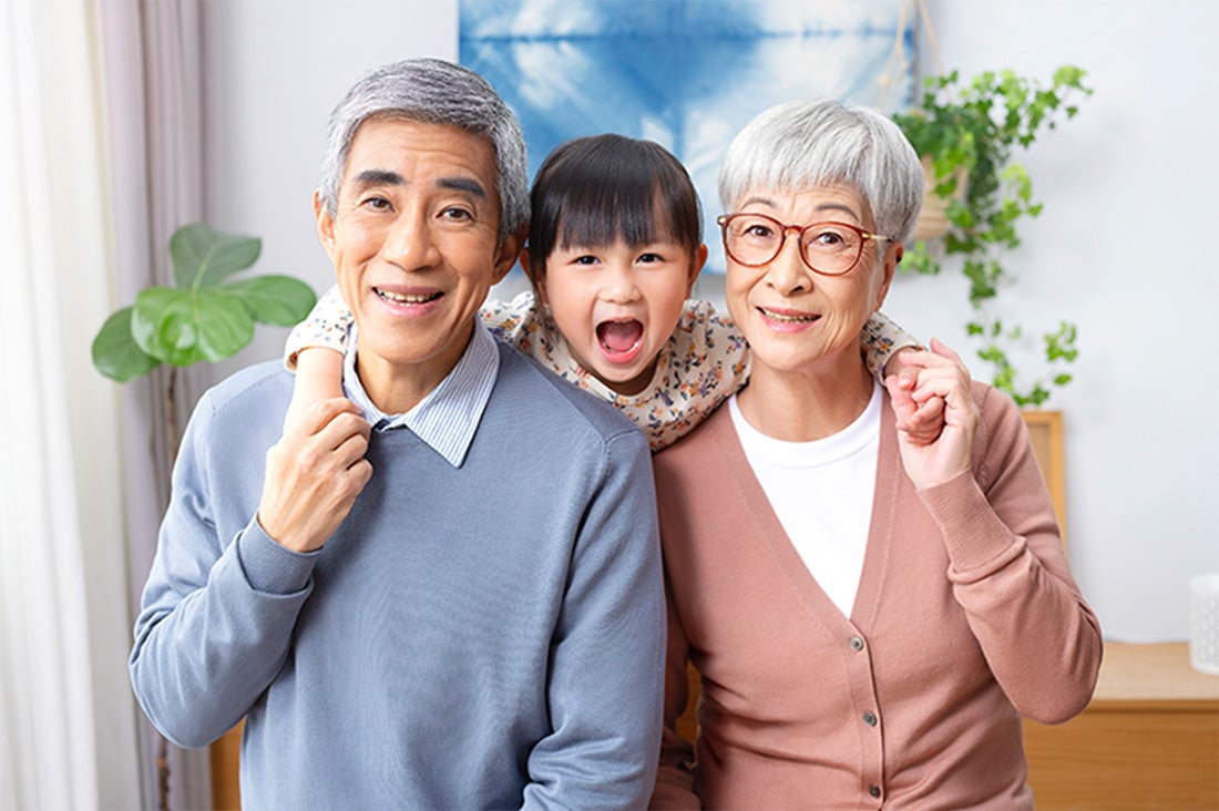 Grandparents with granddaughter